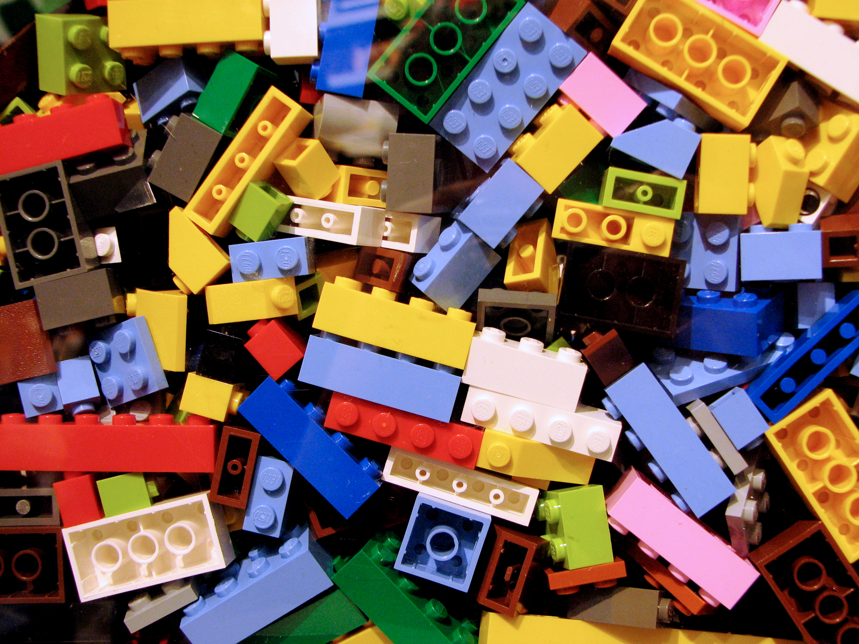 A pile of colorful LEGO blocks.
