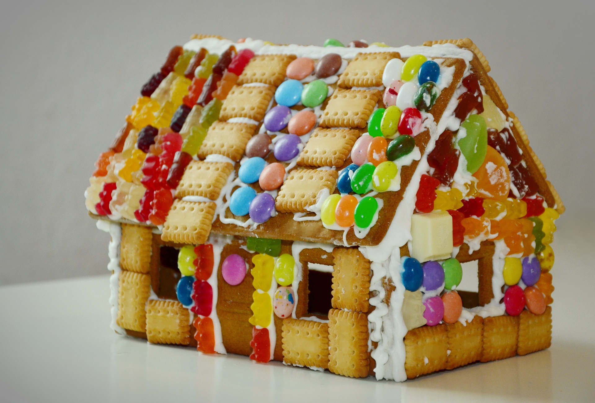 Gingerbread house decorated with candy.
