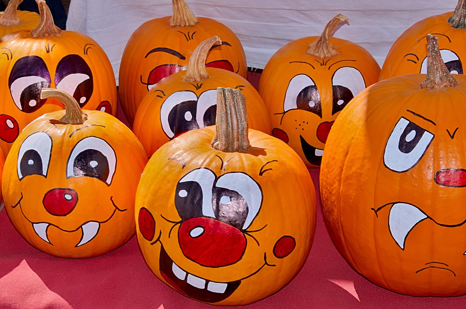 Pumpkins with silly painted faces.