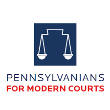 Pennsylvanians for Modern Courts logo: A navy blue square with scales of justice forming the outline of the PA keystone.