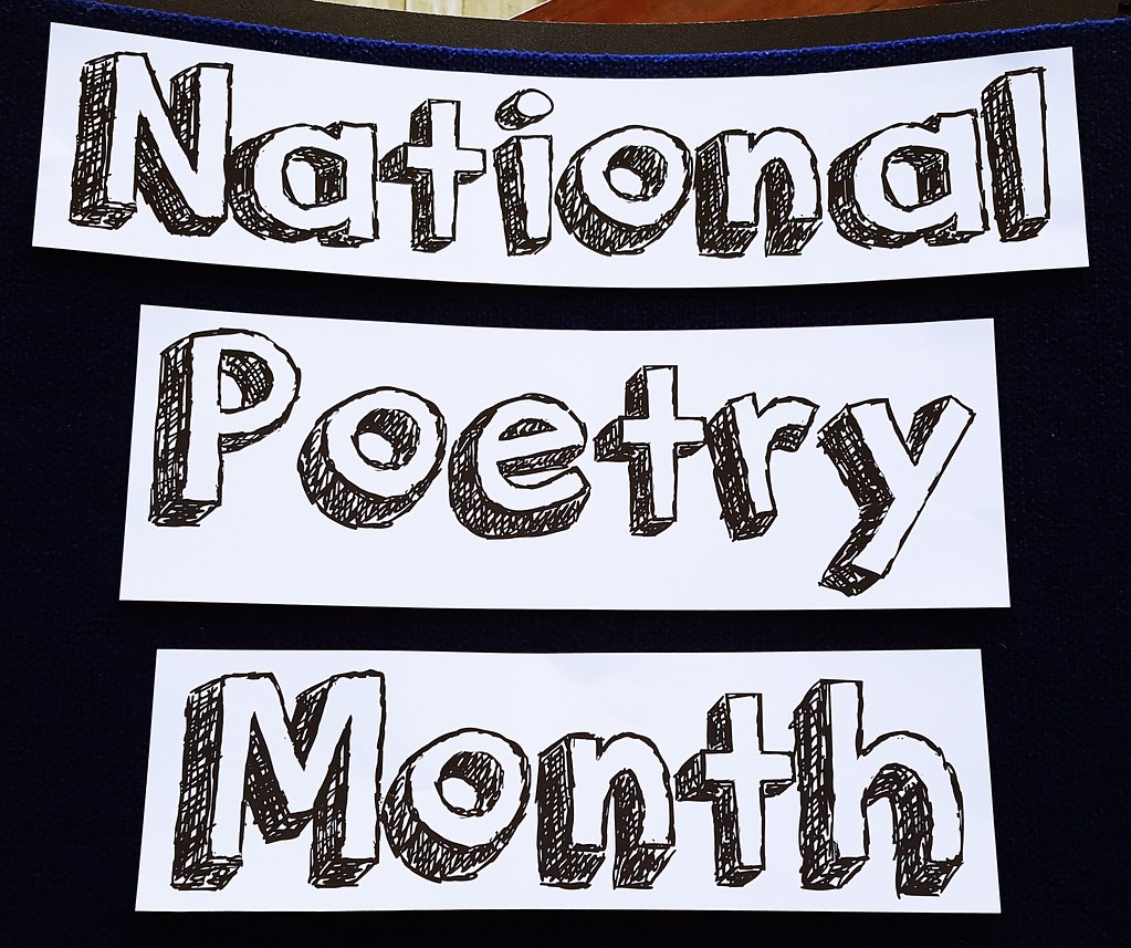 Block letter text reads National Poetry Month