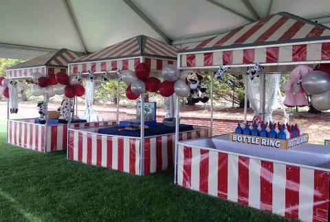 Striped carnival booths.