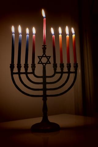 A menorah with all candles lit