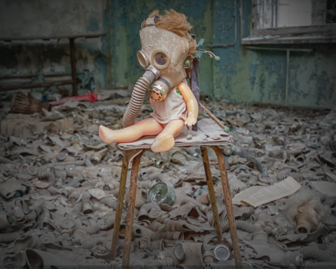 doll with gasmask in rubble from Chernobyl