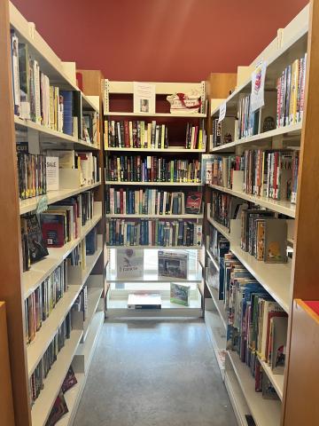 Photo of Sharpsburg Community Library Book Sale Nook fully stocked with books on 3 sides