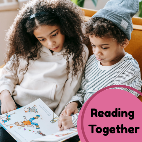 Older child reads with a younger child