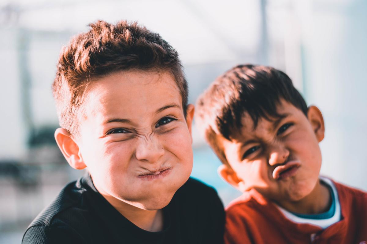 Two boys make funny faces