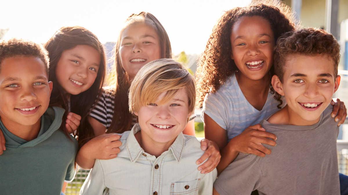 A multicultural group of tweens.