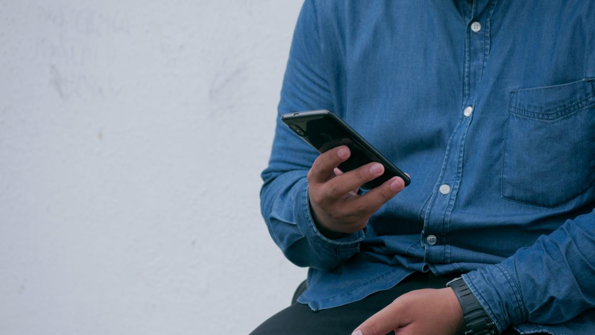 man with mobile device