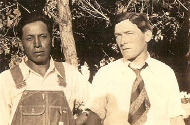 Levi White Bull and Bill Edwards at Sun Dance Arbor during the 1929 gathering of Pine Ridge & Rosebud Sioux