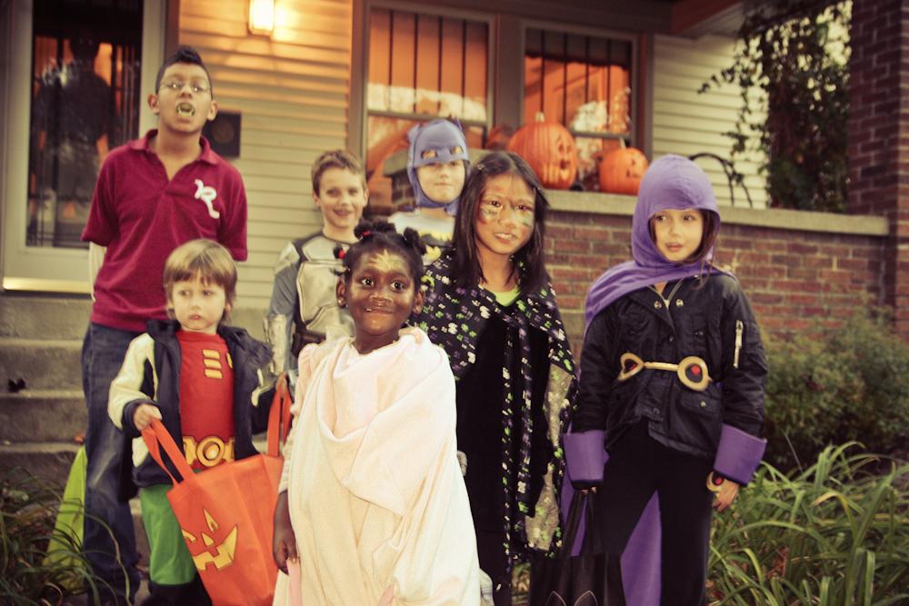 Diverse group of children in costume for Halloween